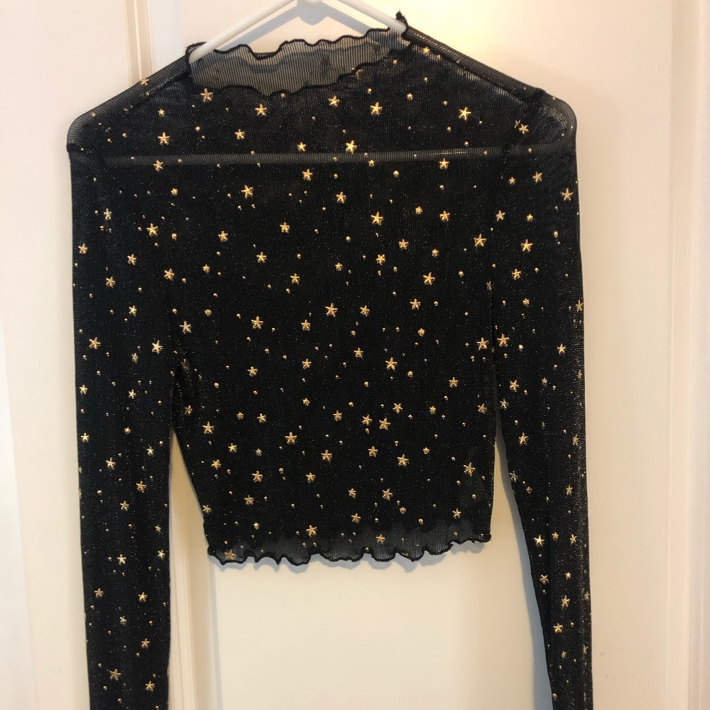 Medium, runs small, stretchy, see through top, star print, long sleeve